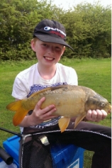 Hayden Sharp with a pole caught carp from Bradley green in 2014.